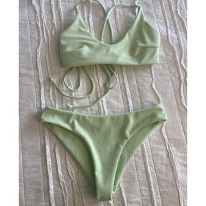 Light pistachio/mint green bikini, like new, never worn, no flaws.